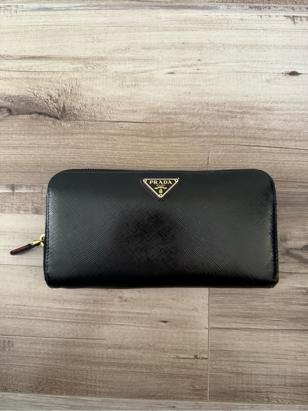 Prada Black Saffiano Zip Wallet with Gold Triangle Logo